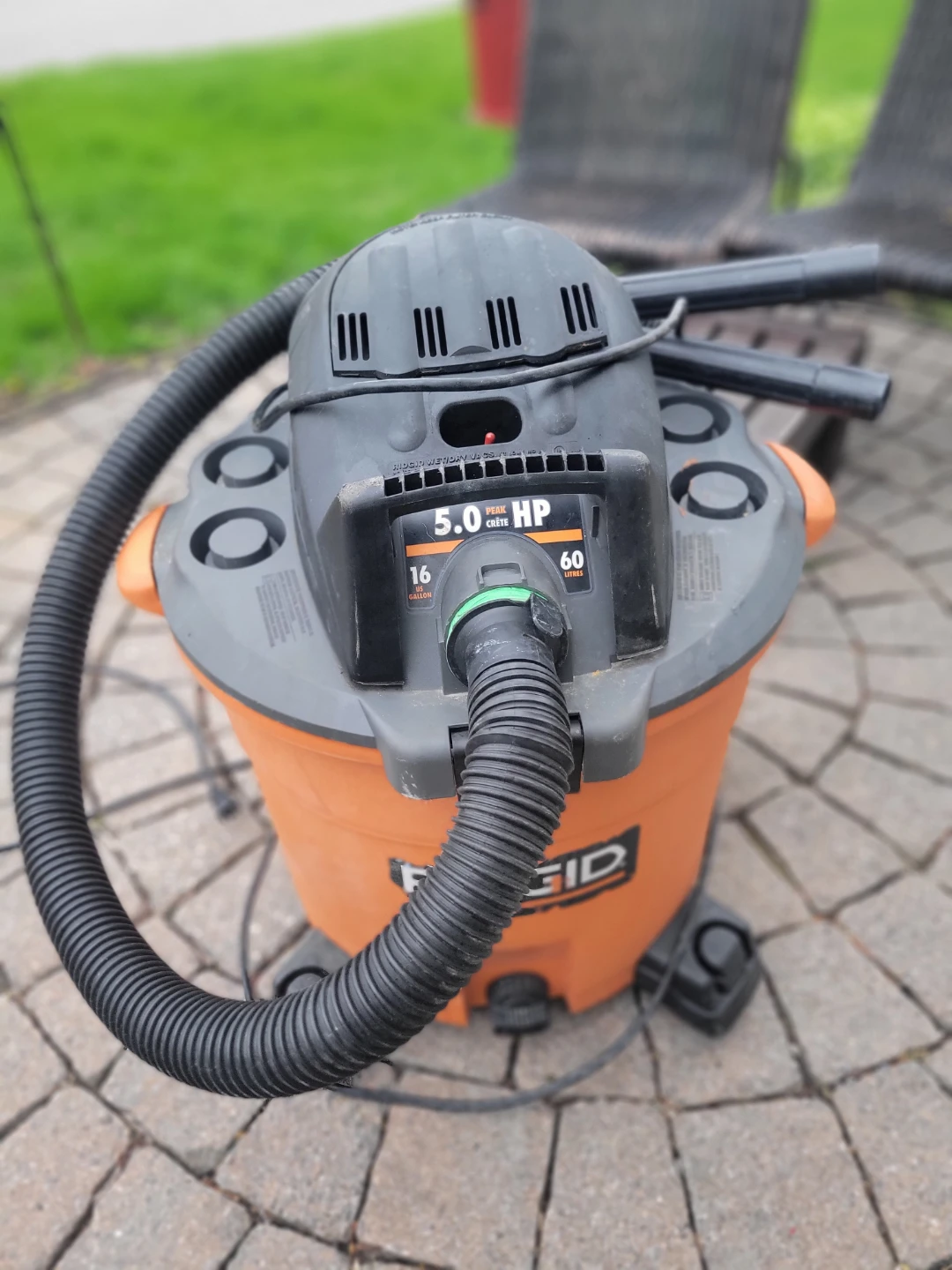 RIDGID Shop Vac, wheelbarrow, lawnmower