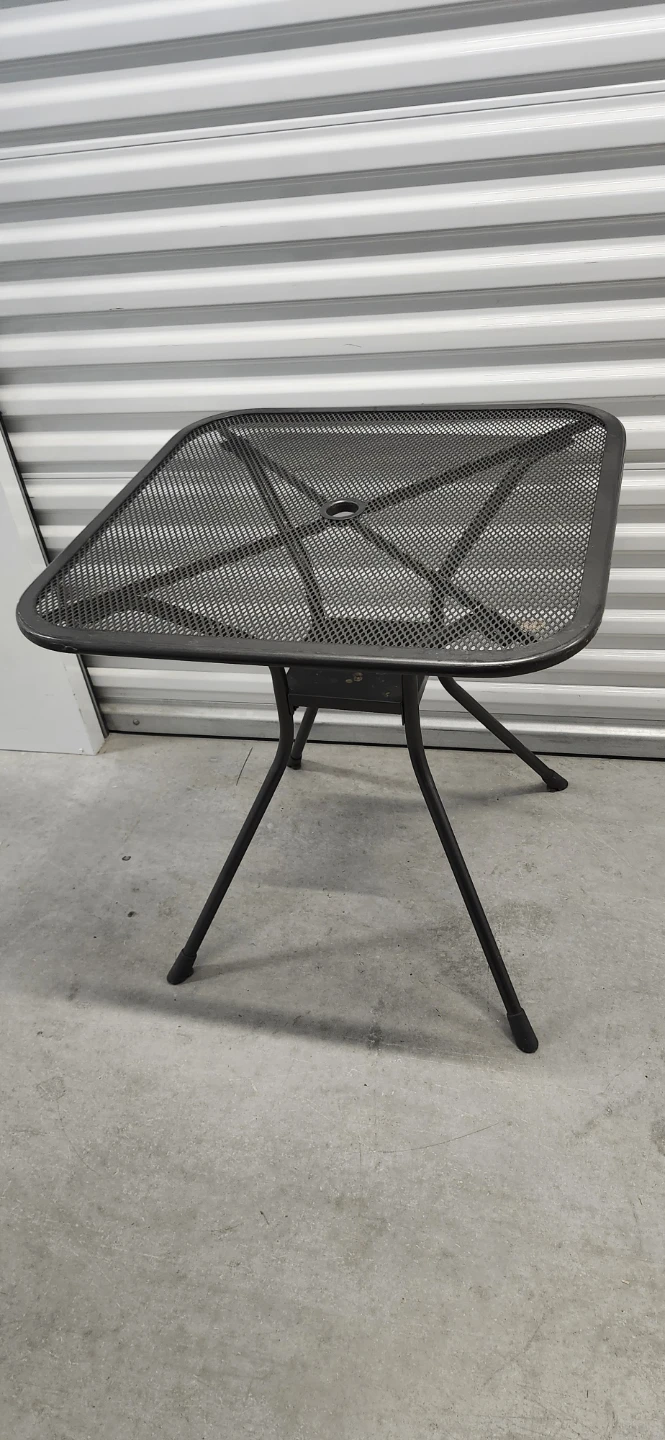 Metal outdoor table with unbilla holes 1.75" hole