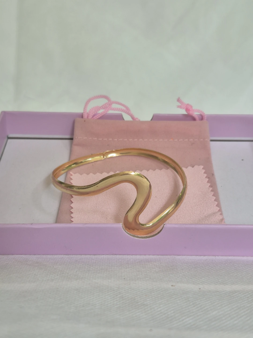 Gold Tone Wave Bangle Bracelet with Pouch