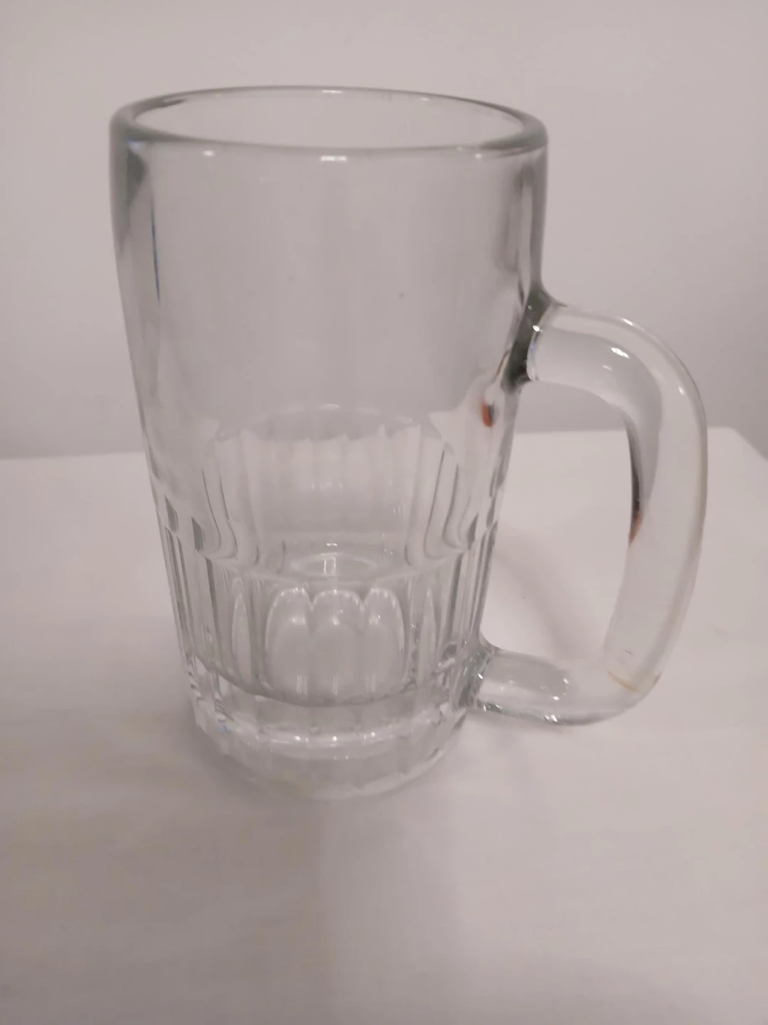 Glass Beer Mug. Pop can for scale only.