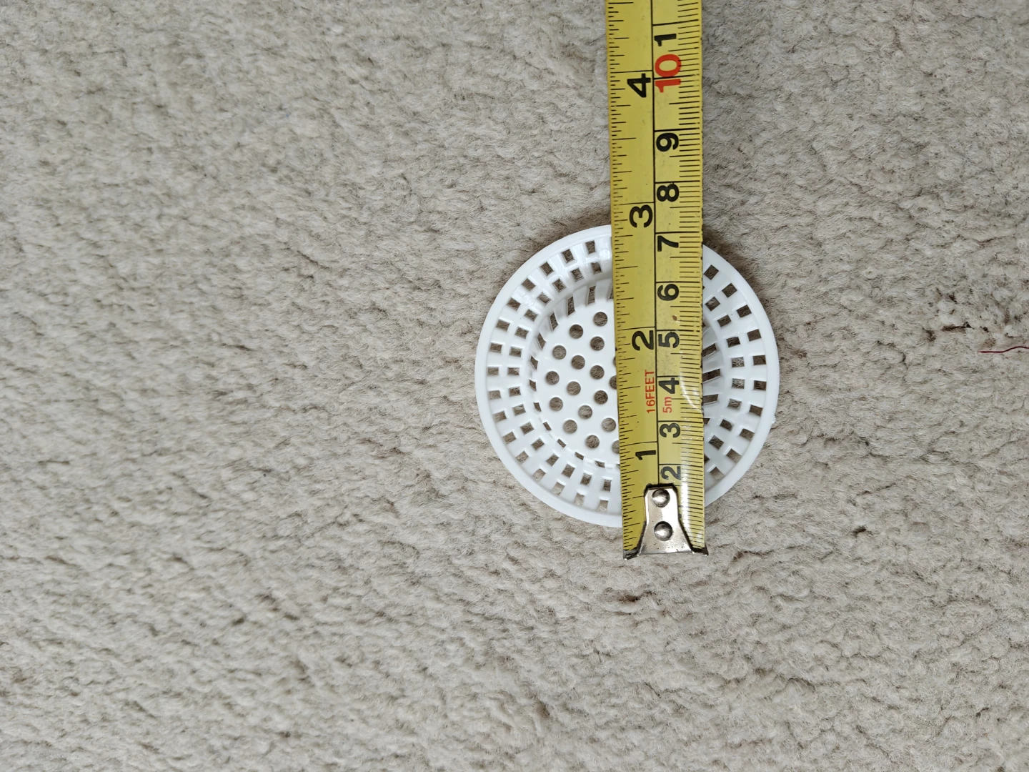 White Plastic Sink Strainers - photo 2