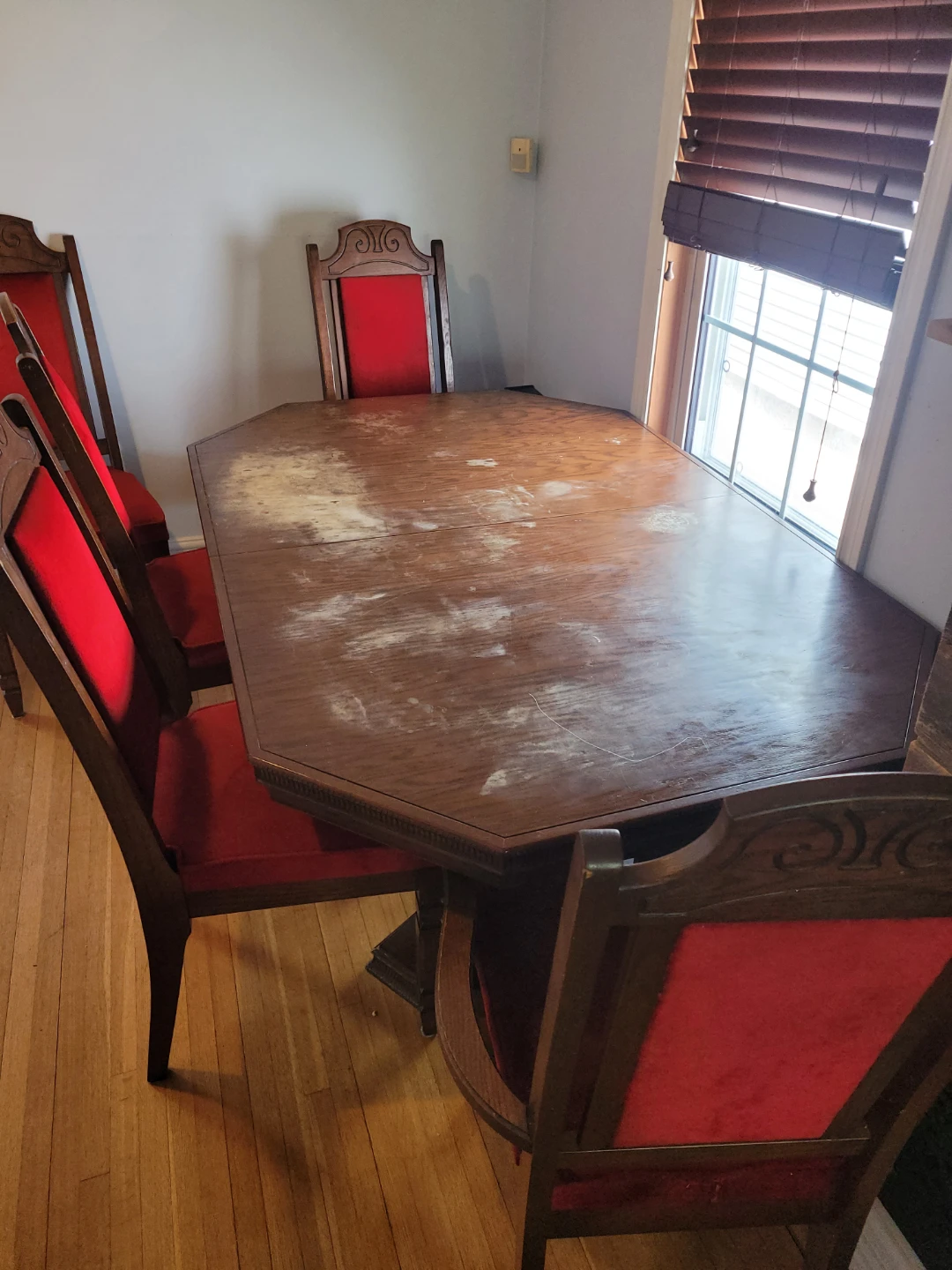 Wooden Dining Table with Red Chairs