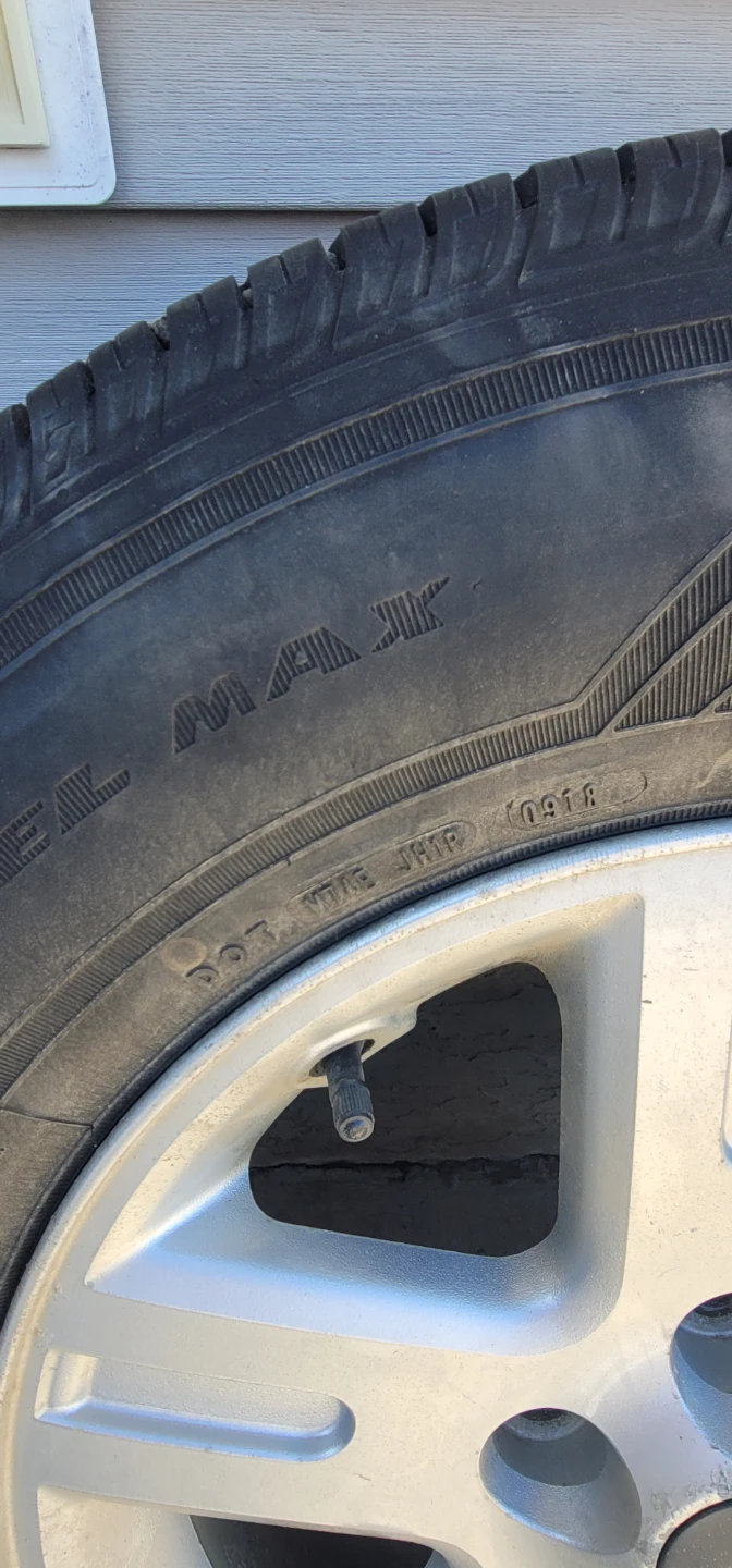Goodyear Assurance tires with rims - photo 2