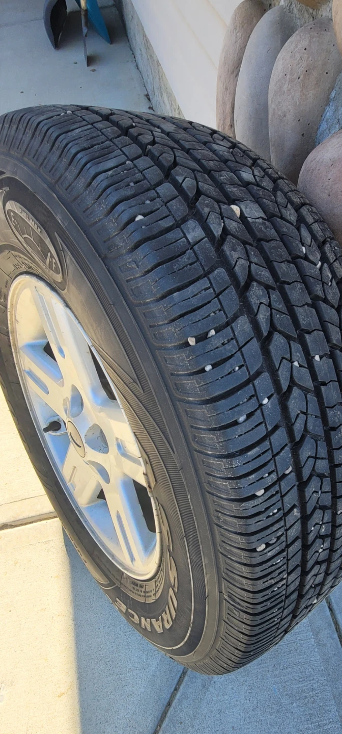 Goodyear Assurance tires with rims - photo 5