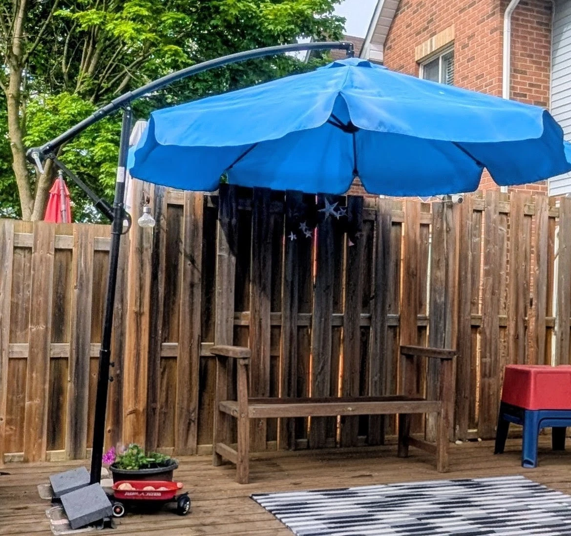 Blue Offset Cantilever Patio Umbrella with stand