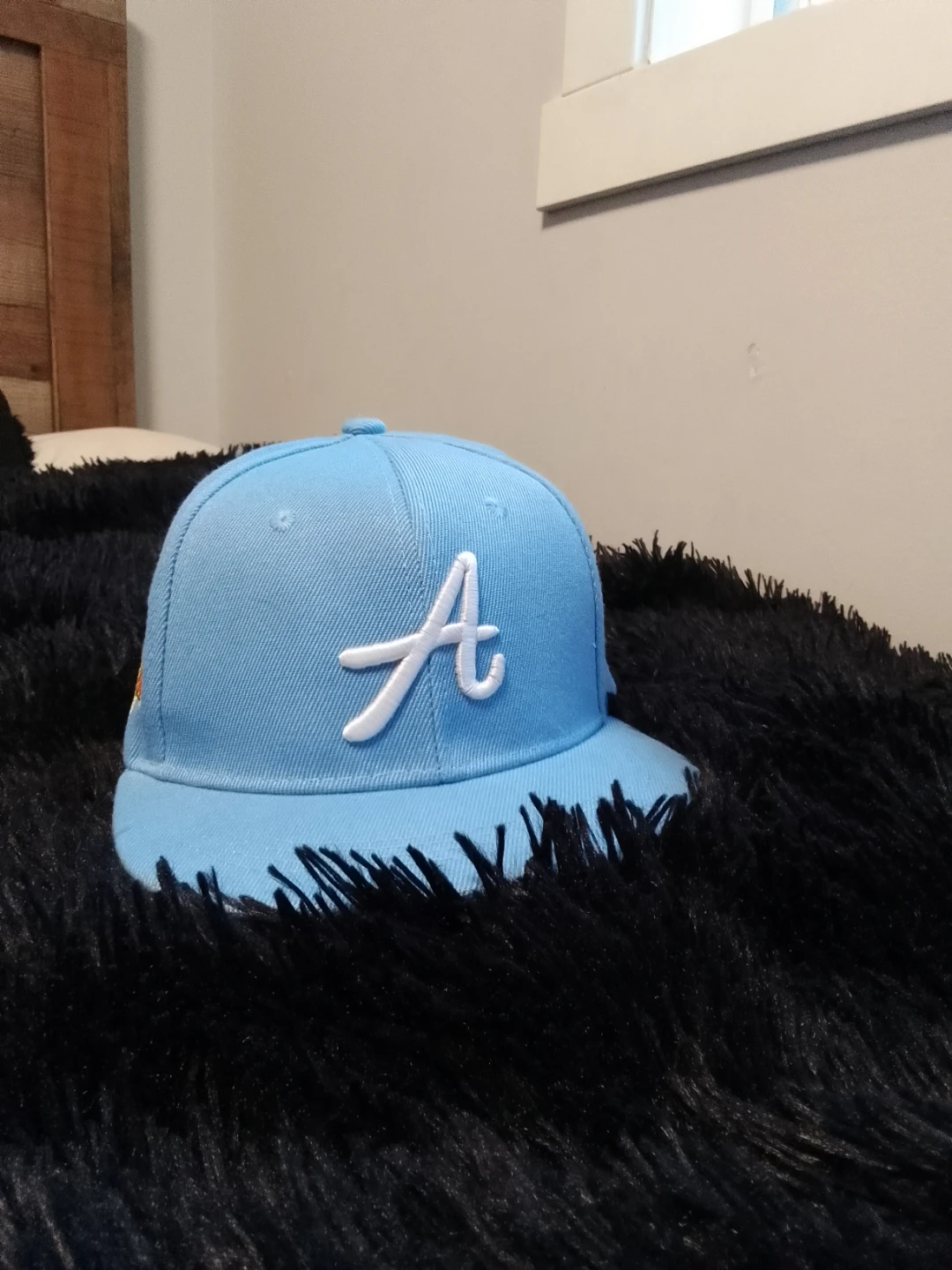 Light Blue Baseball Cap with 'A' Logo
