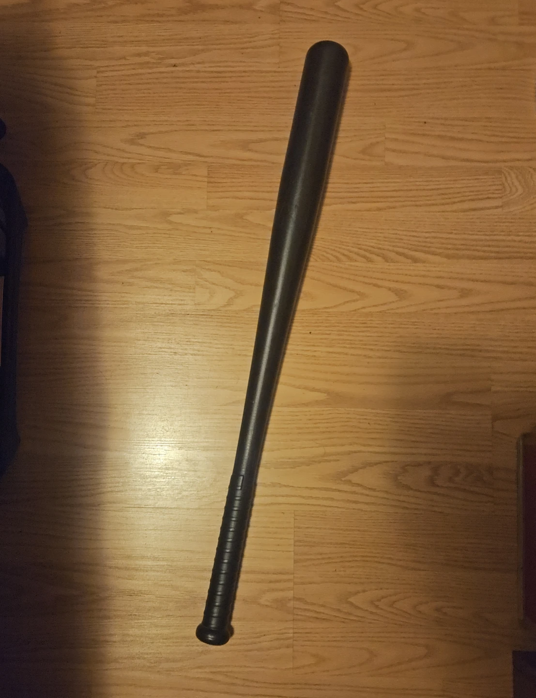 Plastic whiffle ball bat