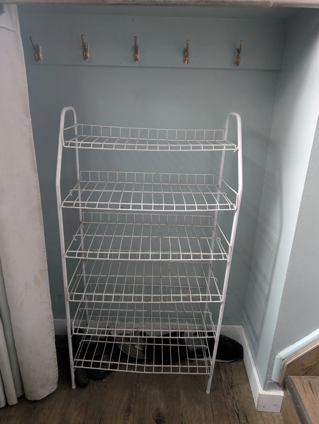 White wire shoe rack with 5 shelves