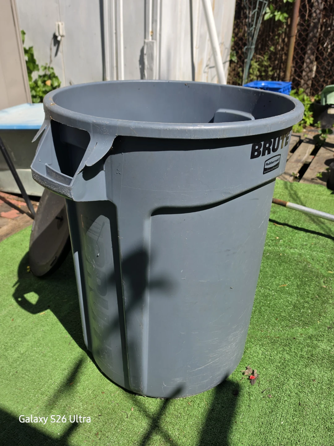 BRUTE 32 Gal. Grey Vented Plastic Outdoor Trash Can