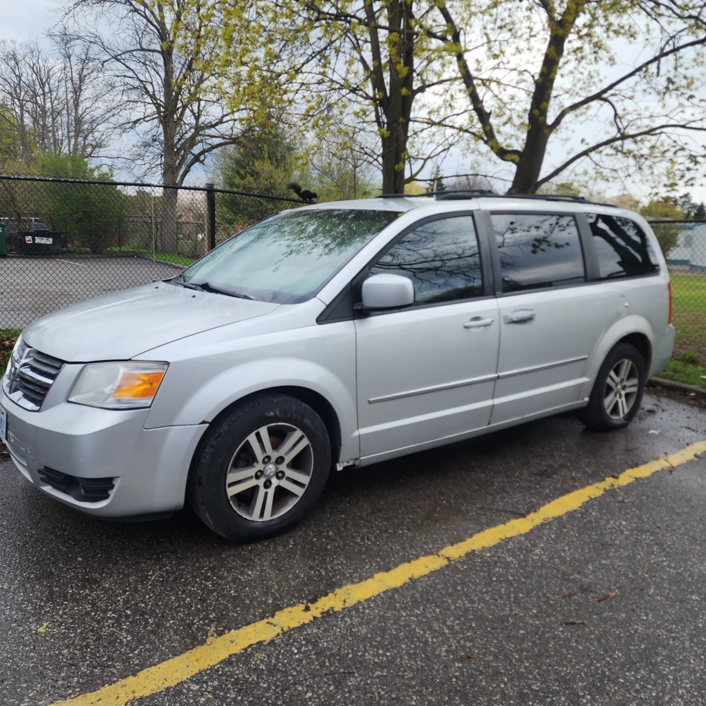 Silver Dodge Grand Caravan Minivan