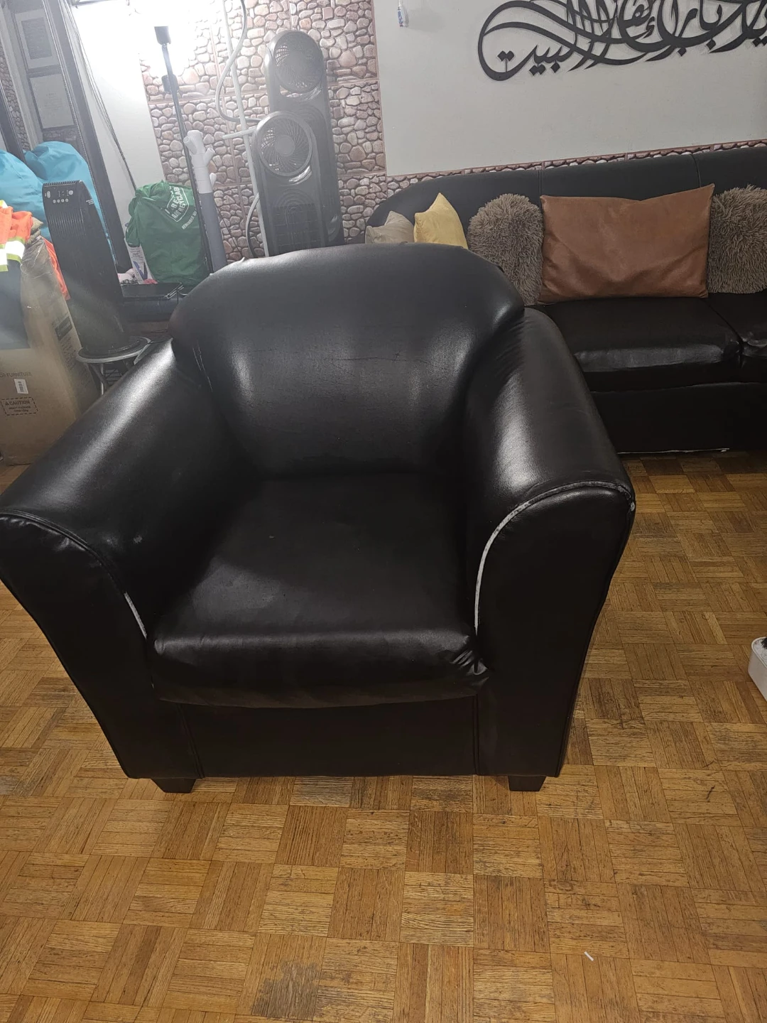 Black artificial Leather Sofa and Armchair Set.