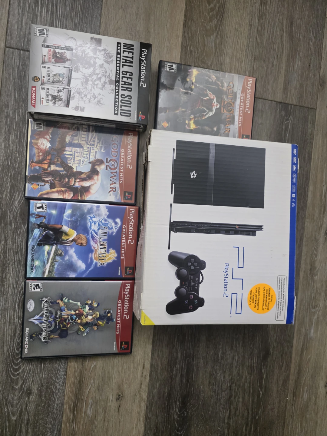 PlayStation 2 Console Bundle with 8 Games