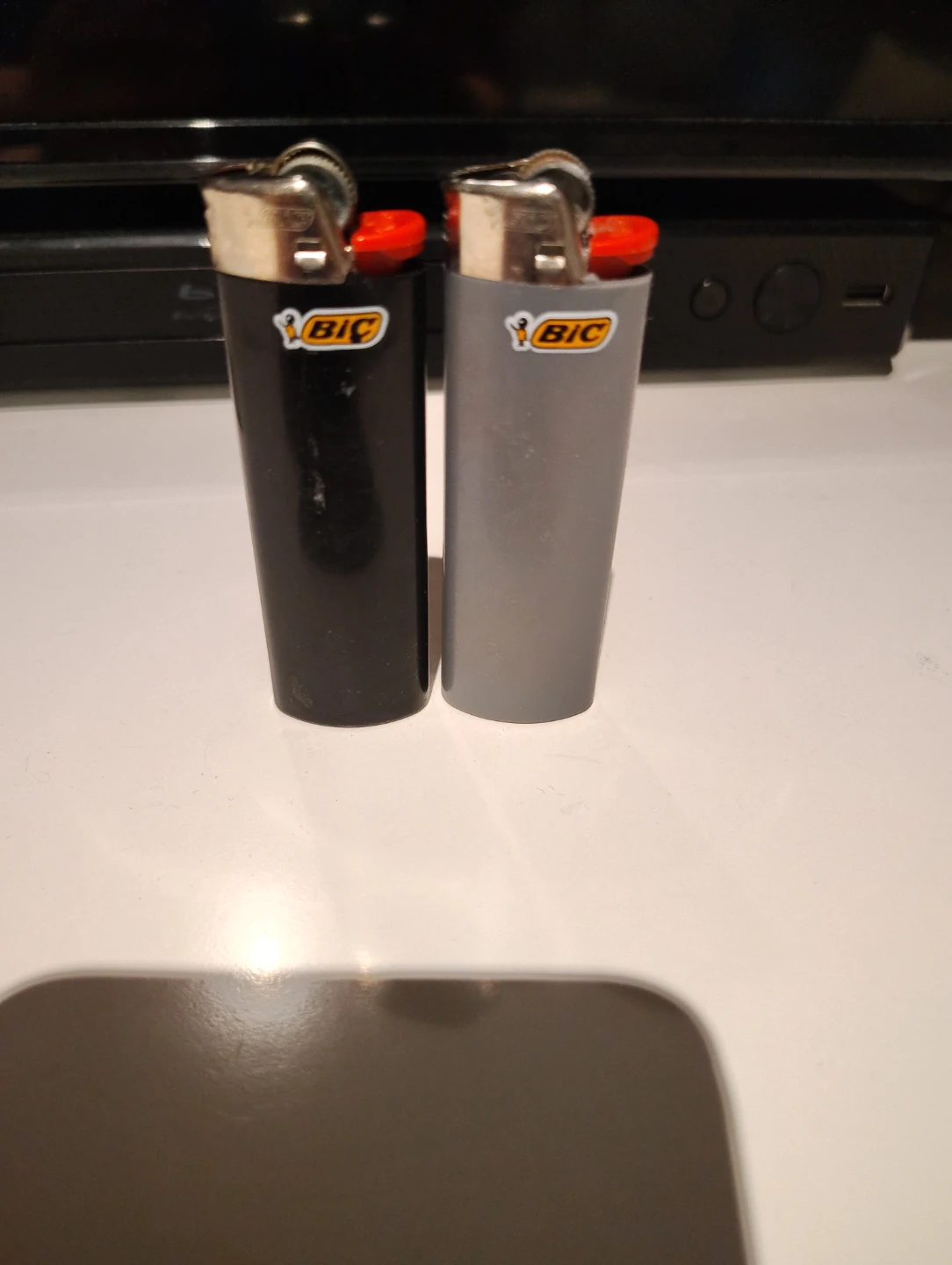 2 BIC Lighters - Black and Grey