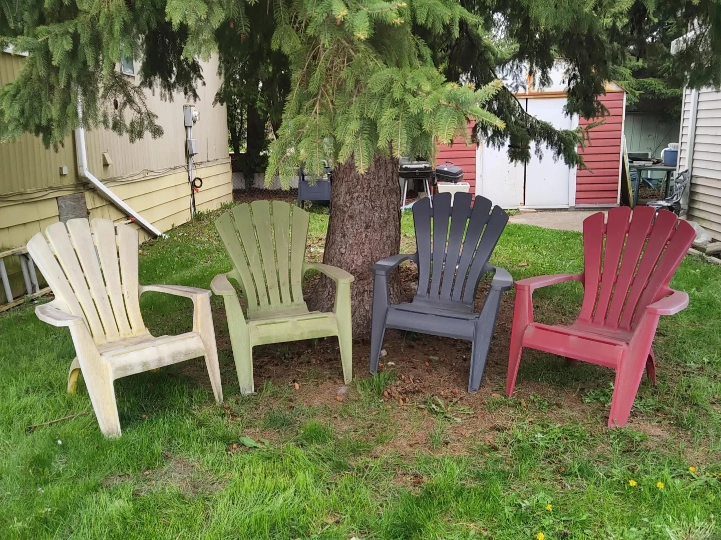 Four Plastic Adirondack Chairs