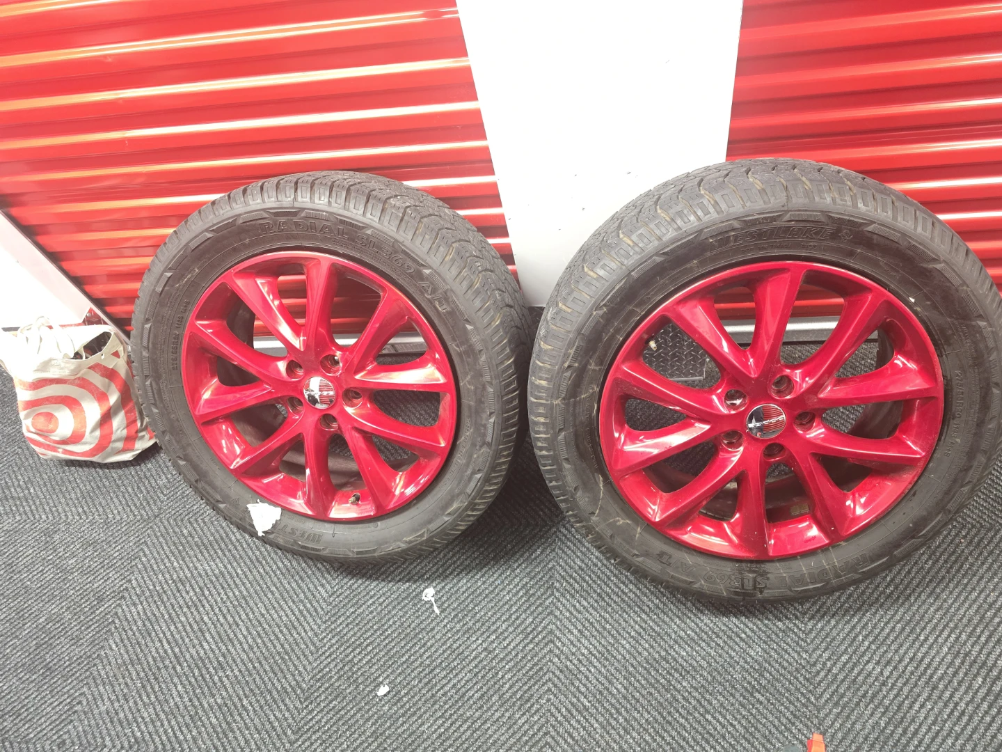 275/55R20 M+S Tires with Red Rims