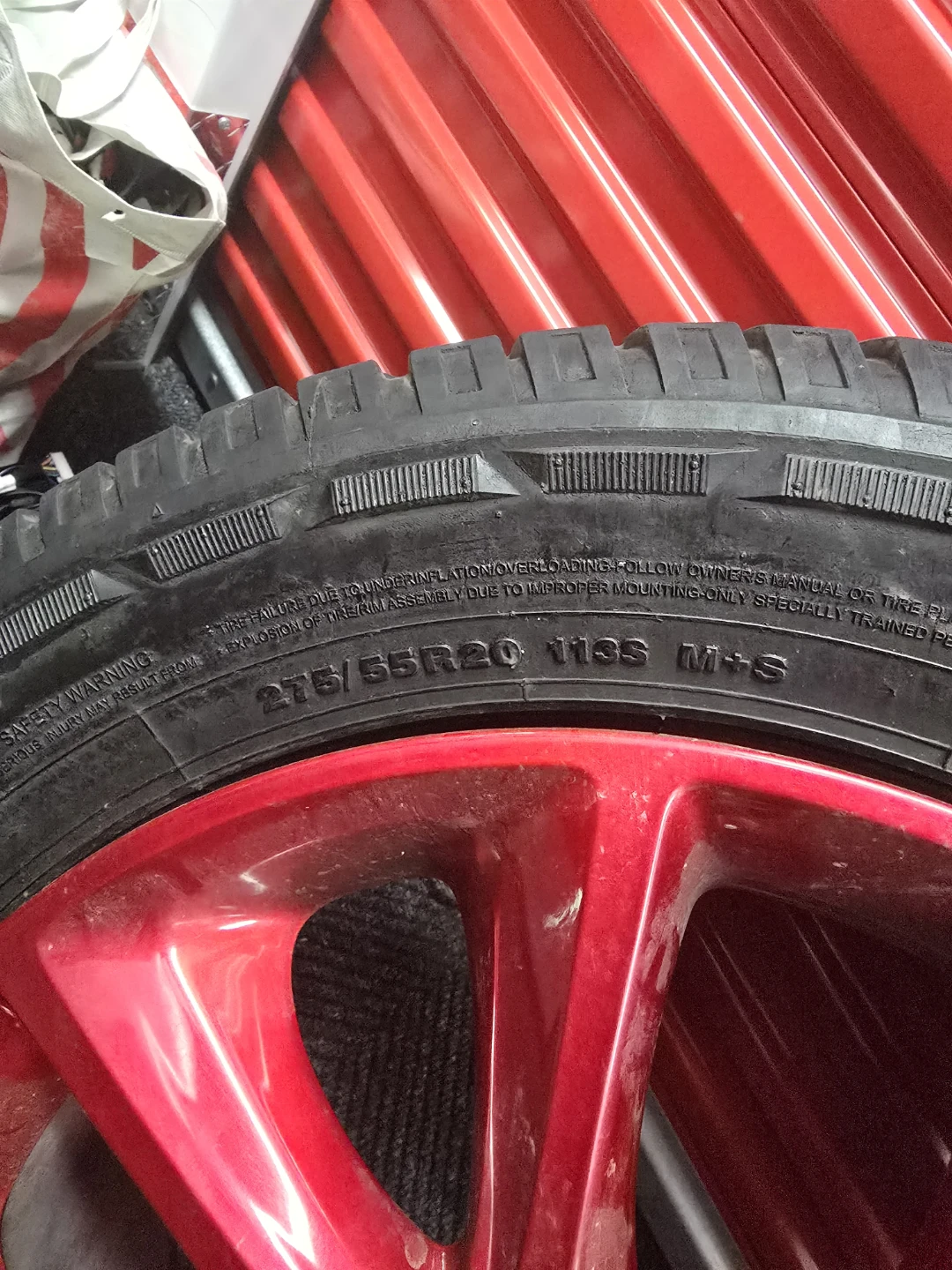 275/55R20 M+S Tires with Red Rims - photo 3