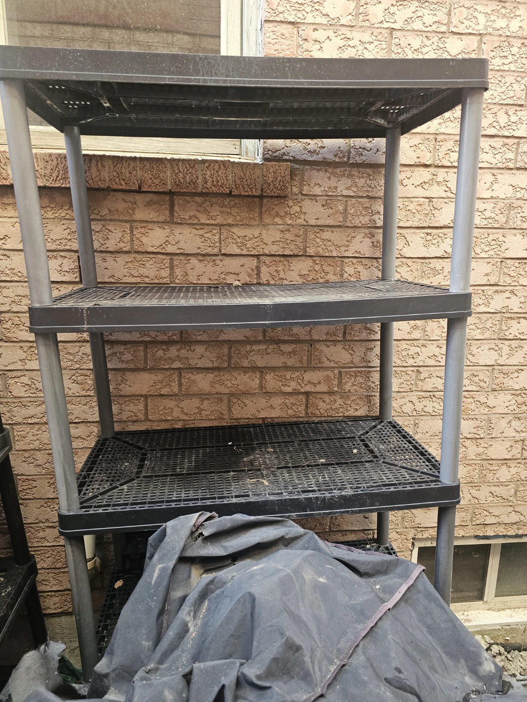 4-Tier Black Plastic Shelving Unit
