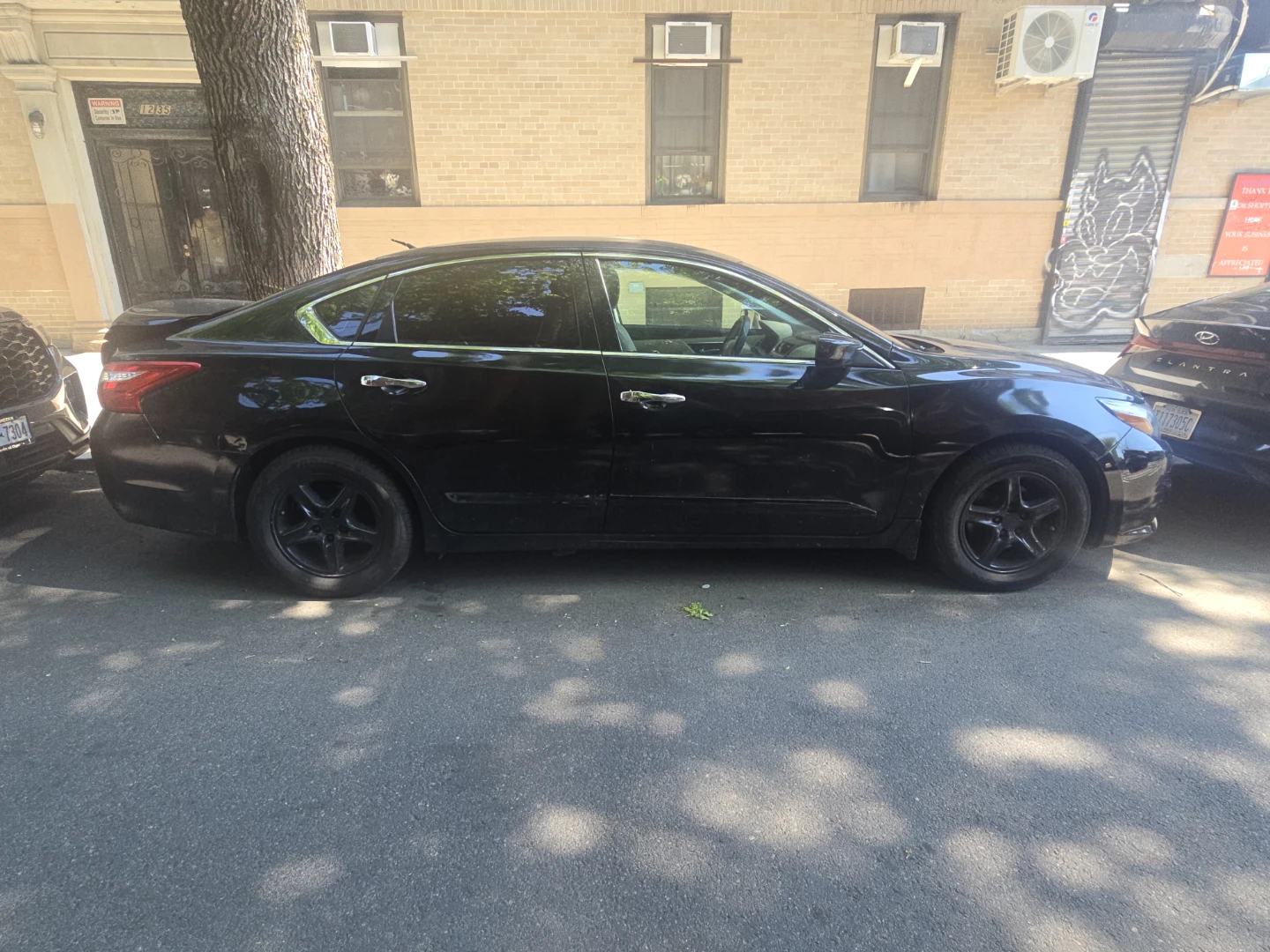 Black Nissan Altima Sedan