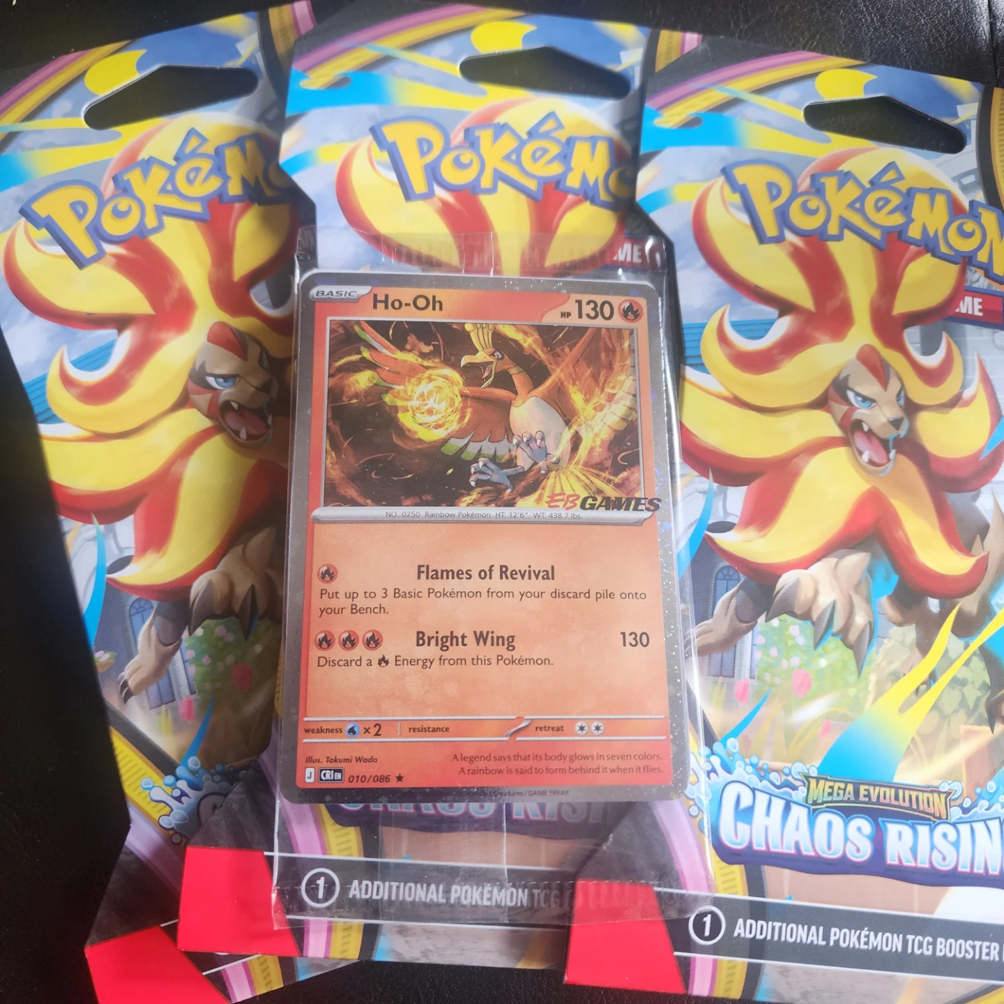 Pokemon TCG Chaos Rising Booster Packs with Eb Games Ho-Oh Card