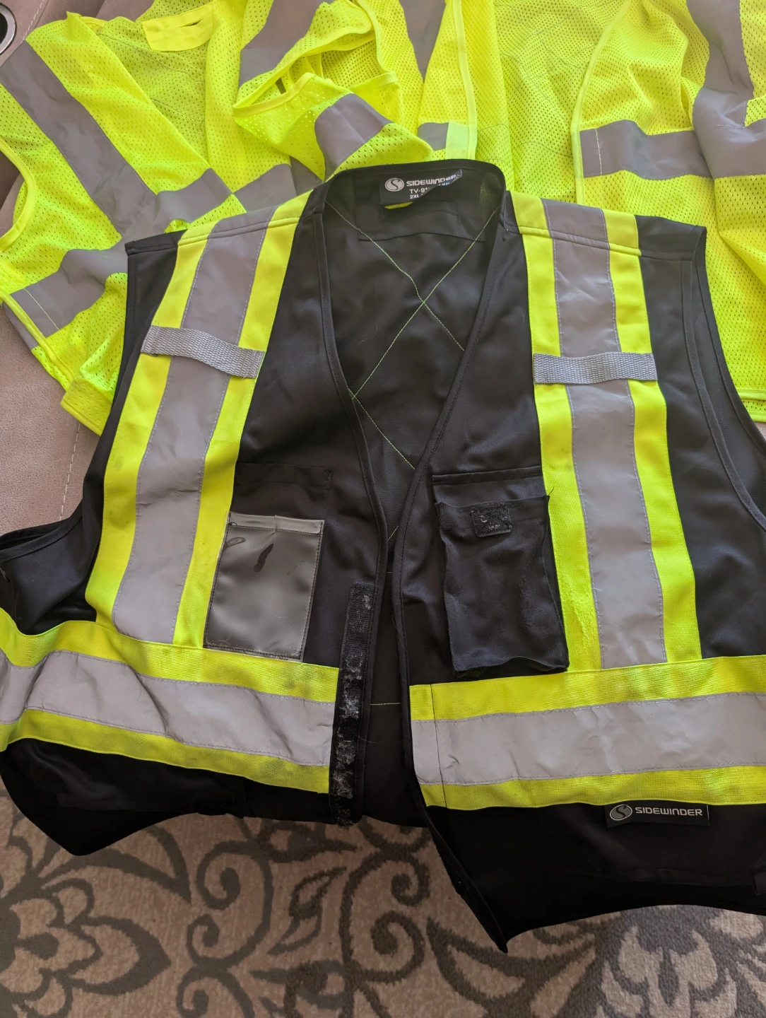 High-Visibility Safety Vests and Black Work Vest
