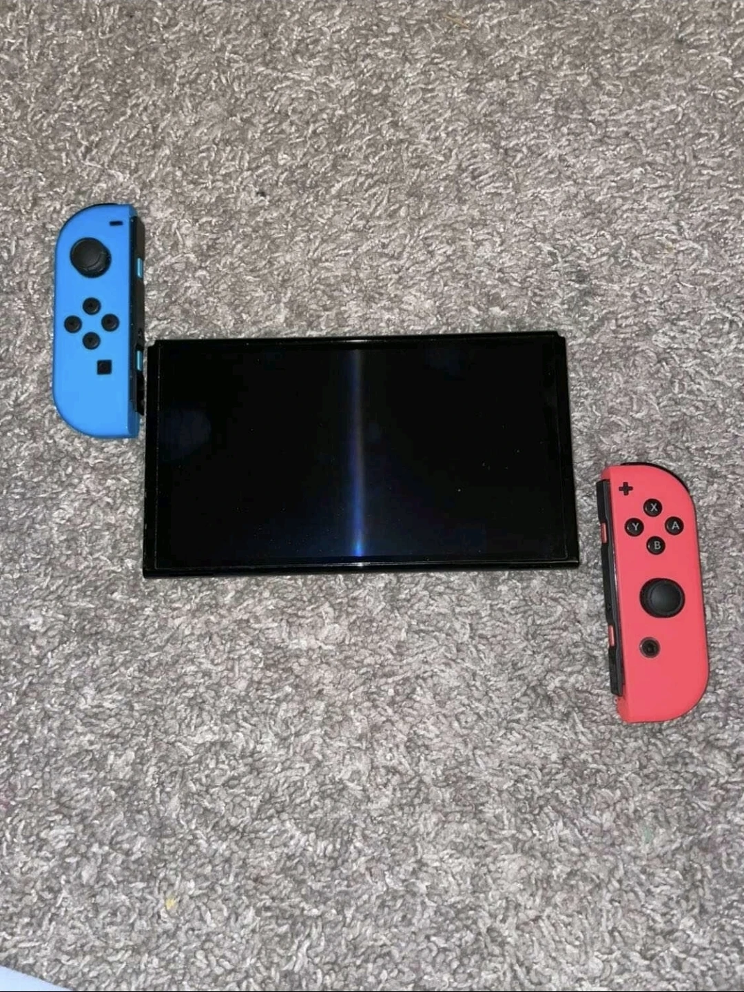Nintendo Switch Console with Neon Blue and Red Joy-Cons