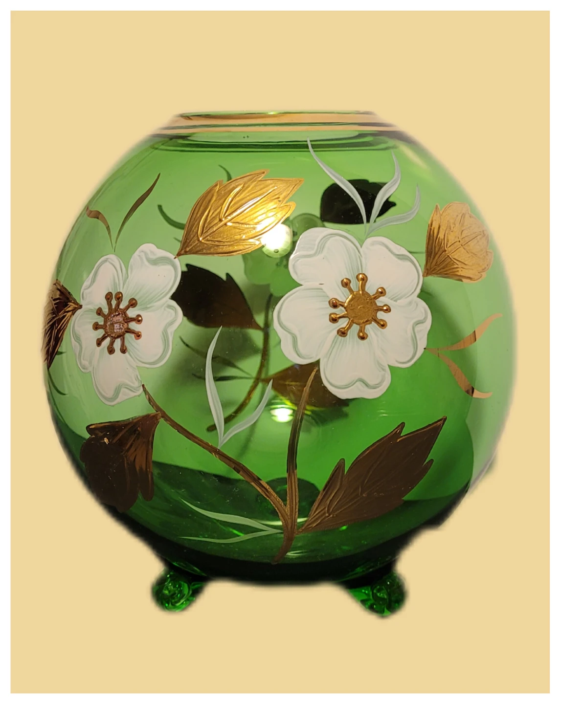 Green Glass Vase with White Flowers and Gold Accents