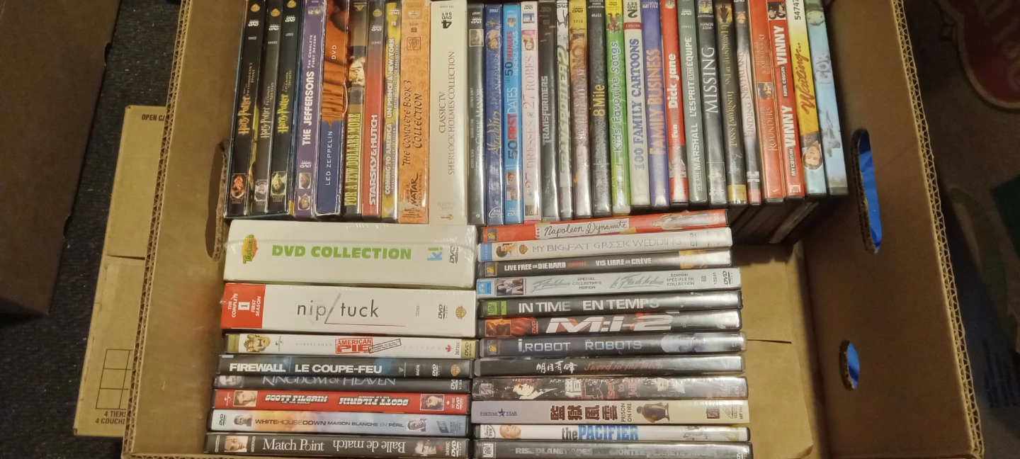 1 box of 57 Assorted DVD Collection - Various Titles