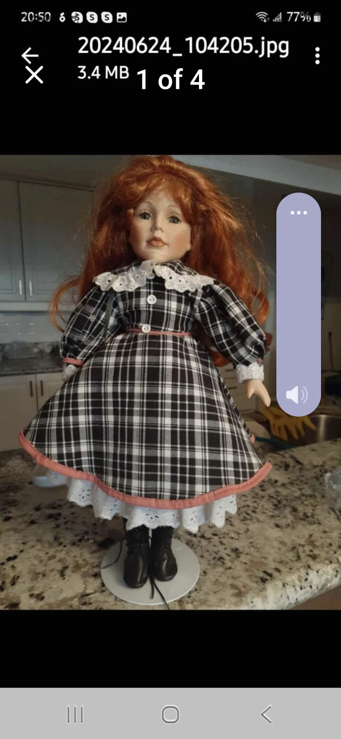 Collectible Porcelain Doll with Red Hair