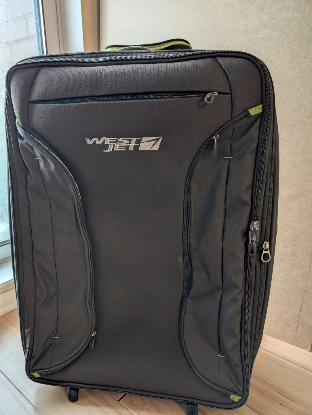 WestJet Rolling Suitcase - photo 2