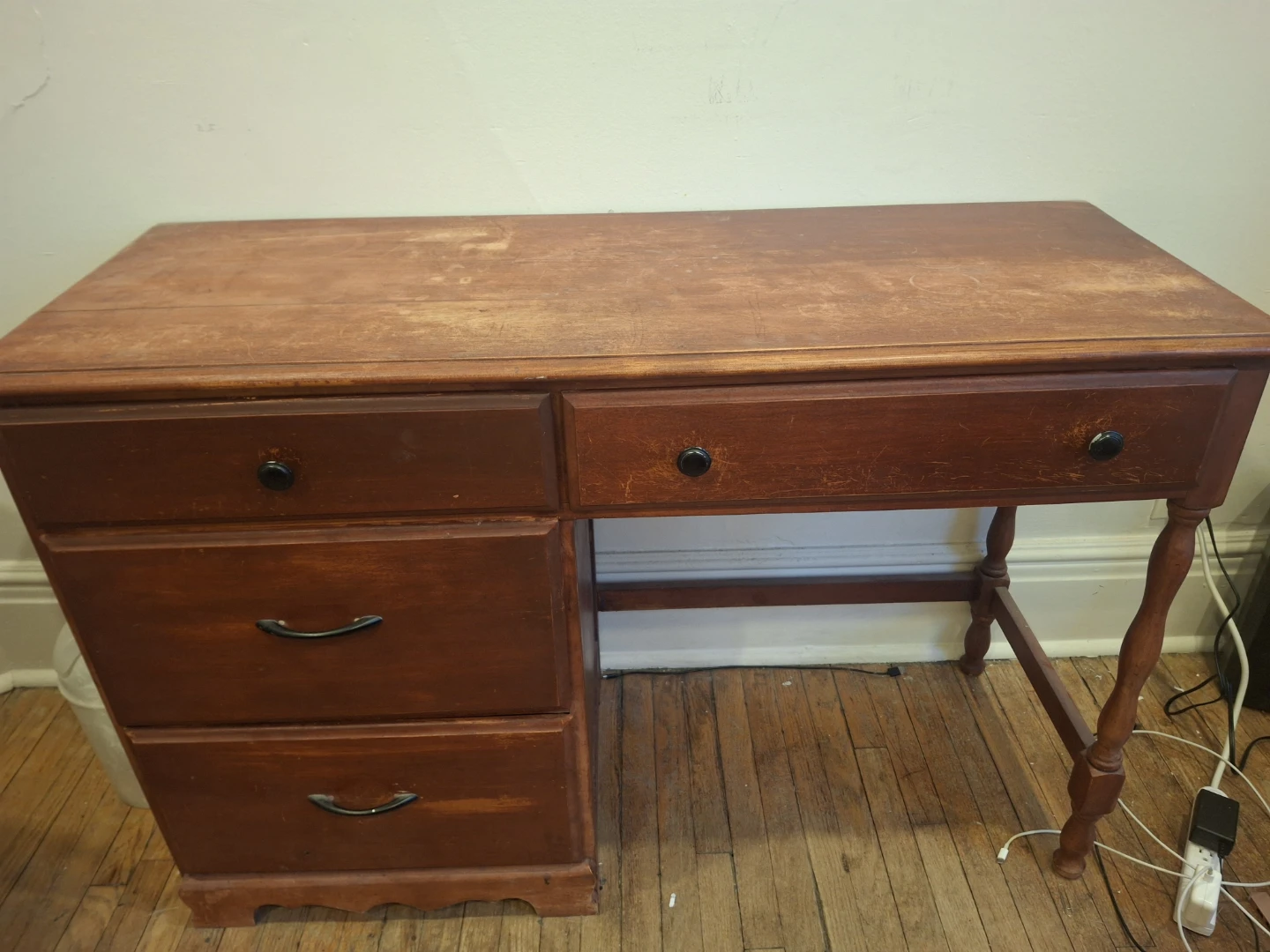 Wooden writing desk with drawers
