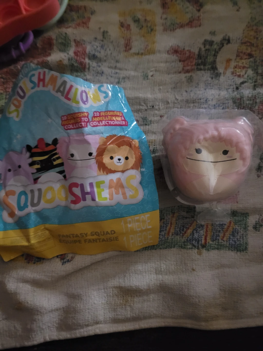 Squishmallows Squooshems Brina the Pink Bigfoot stress toy.