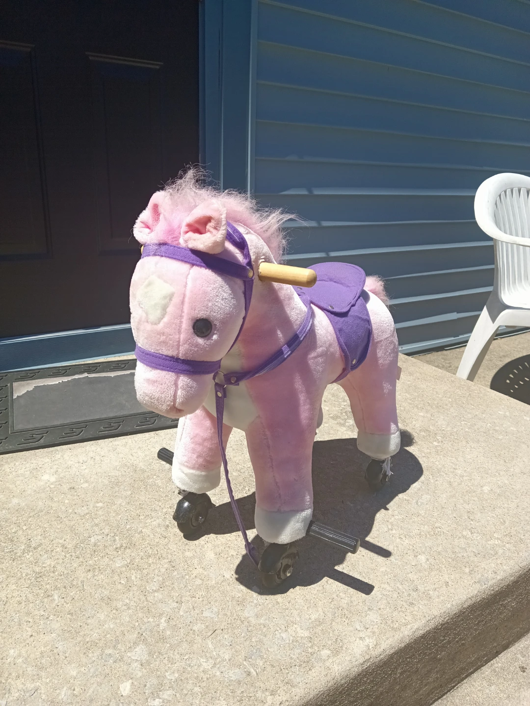 Pink Plush Ride-On Horse Toy with Wheels