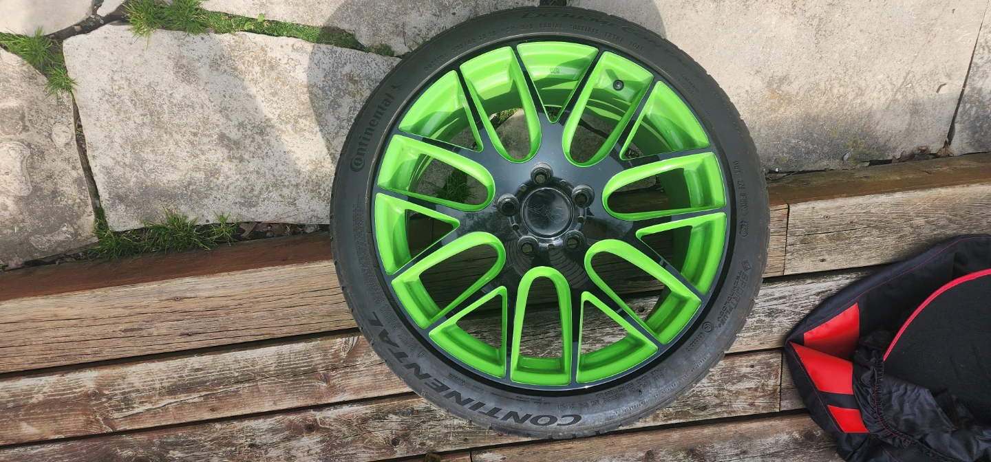 4 continental tires with custom wheels.