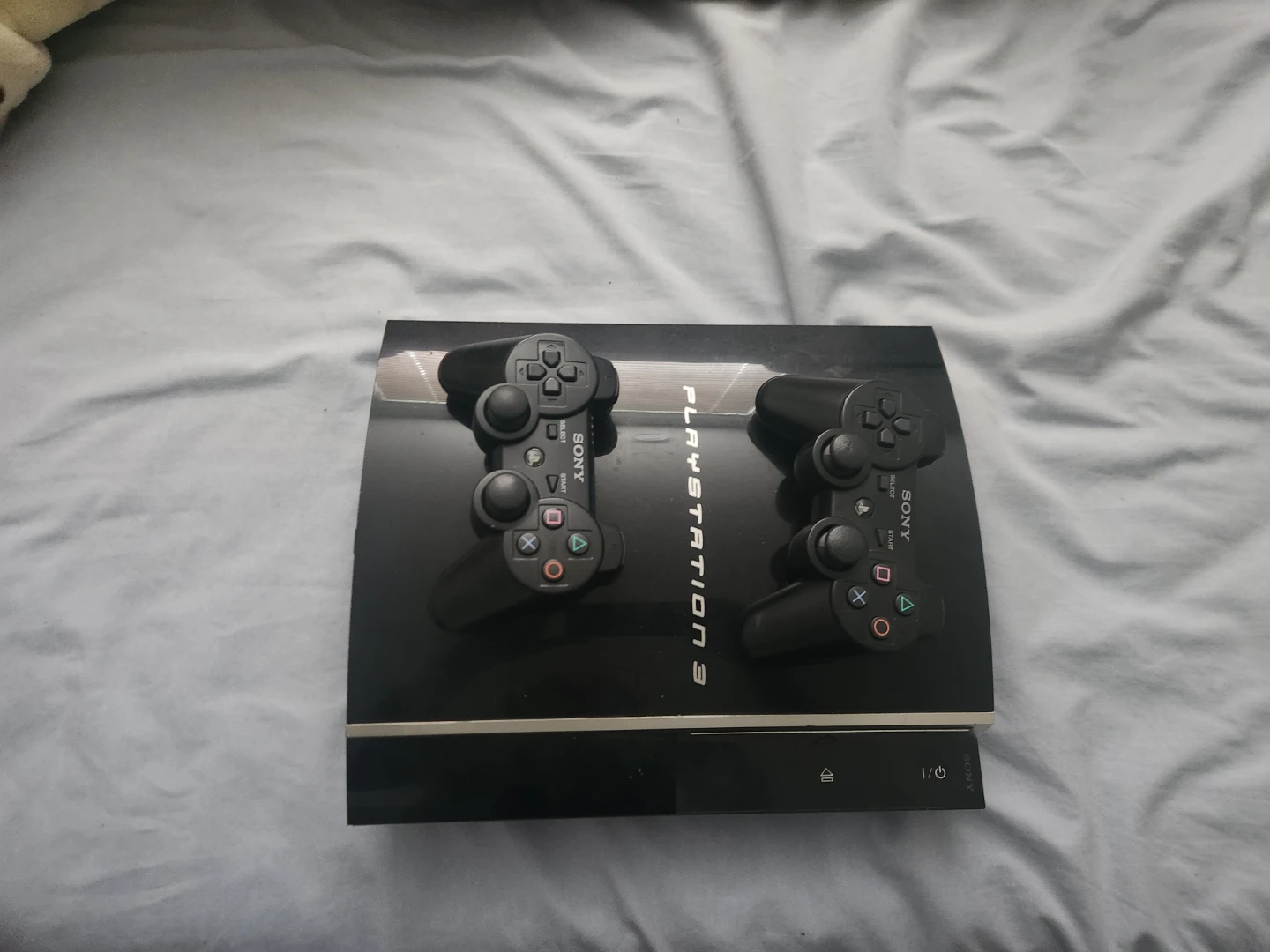 Sony PlayStation 3 Console with Two Controllers
