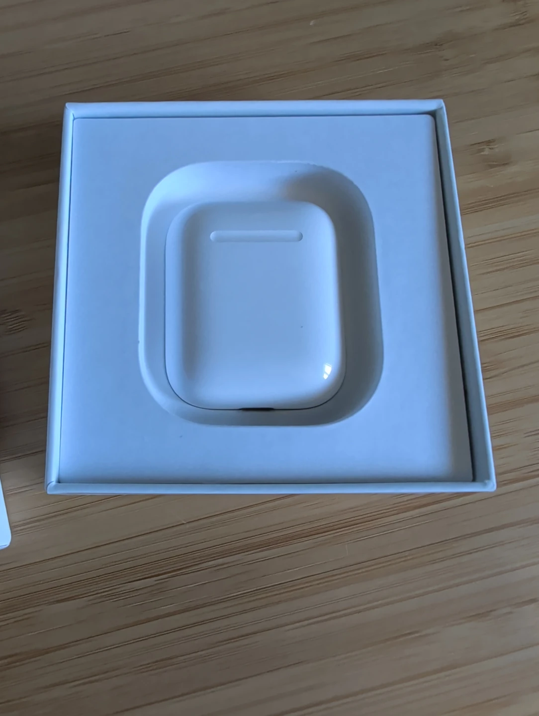 Apple AirPods (2nd generation) with Charging Case - photo 2