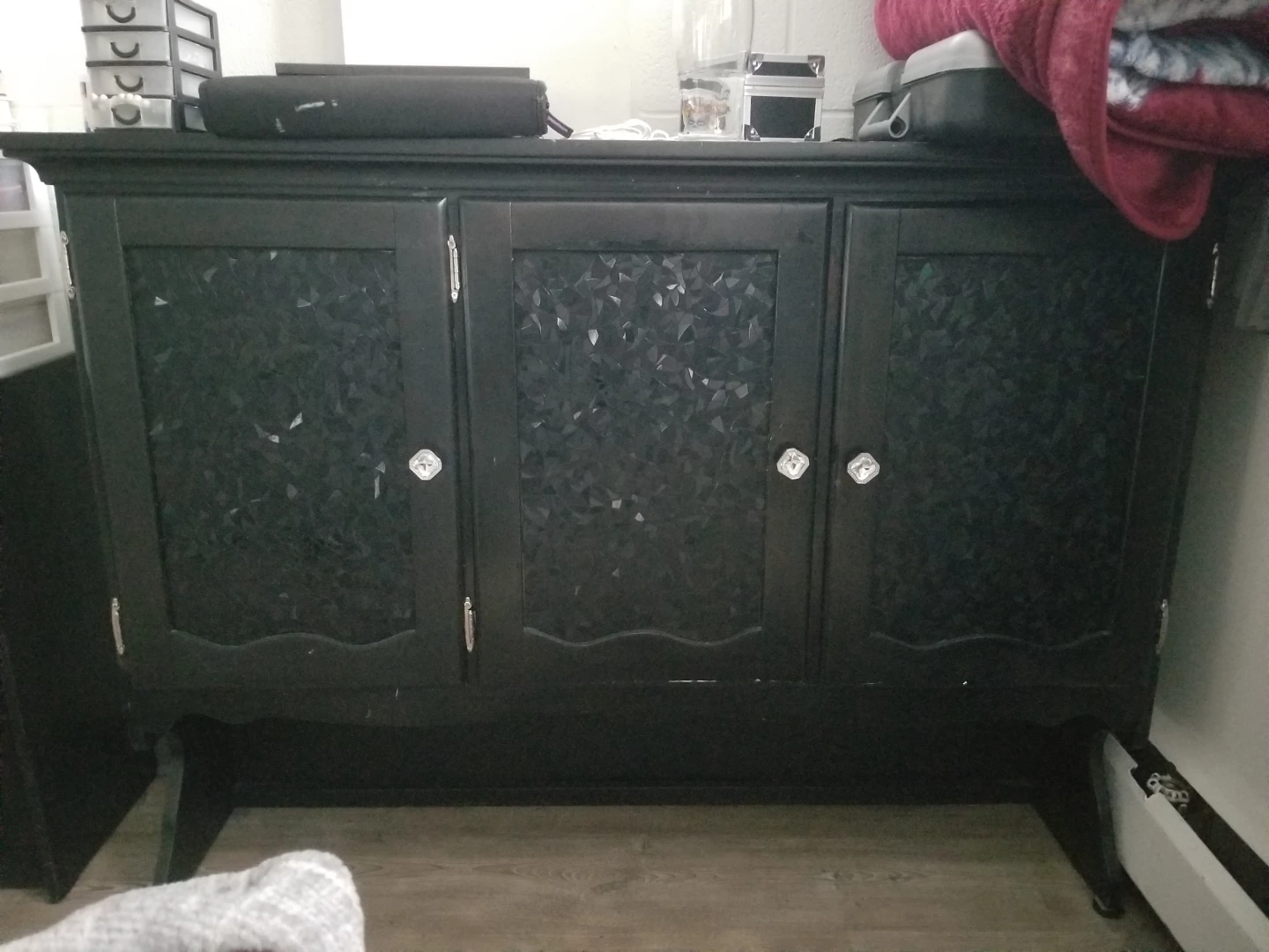 Black Three-Door Cabinet with Textured Glass Fronts