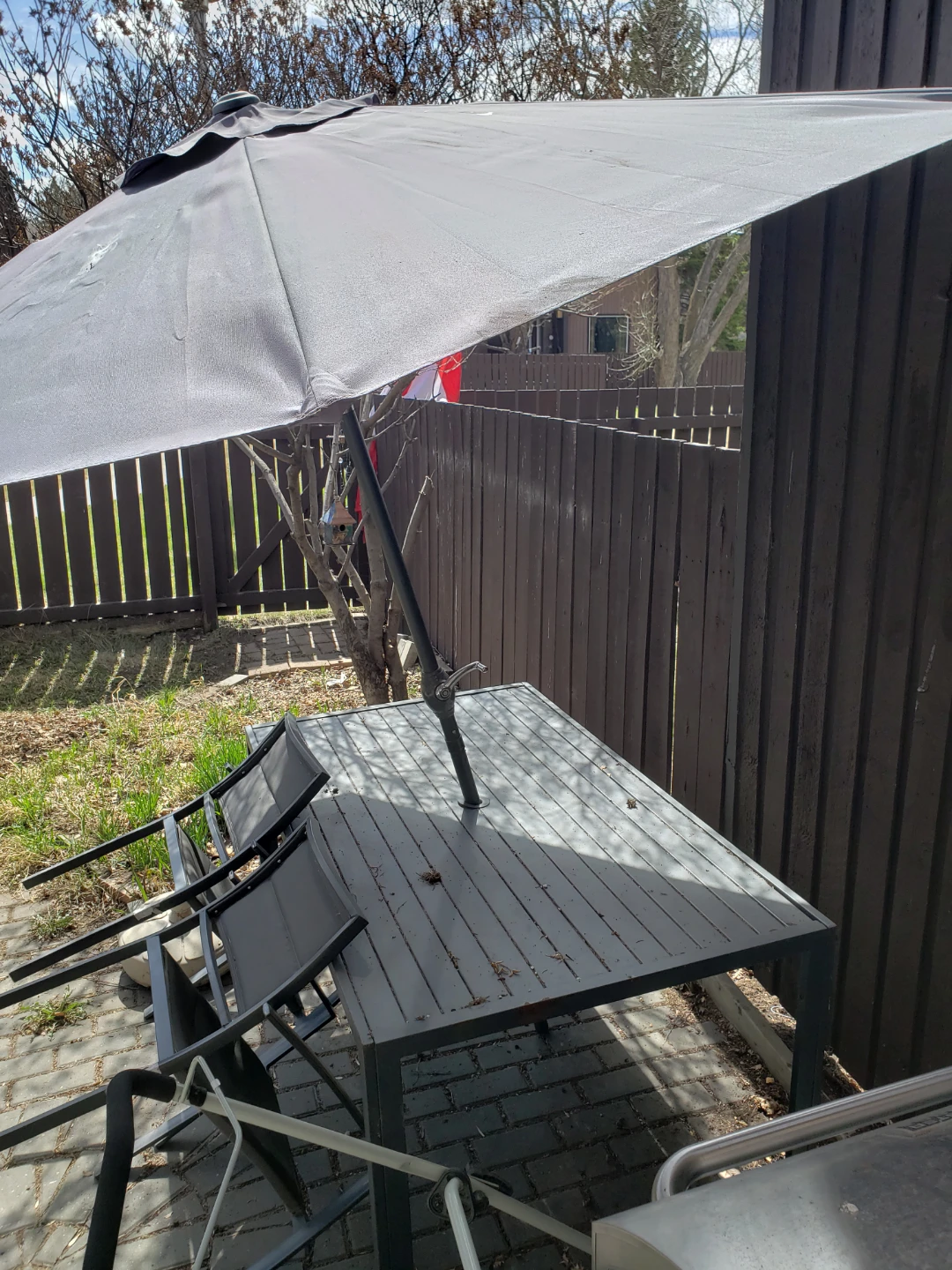 Grey Patio Table with Umbrella and Chairs - photo 4