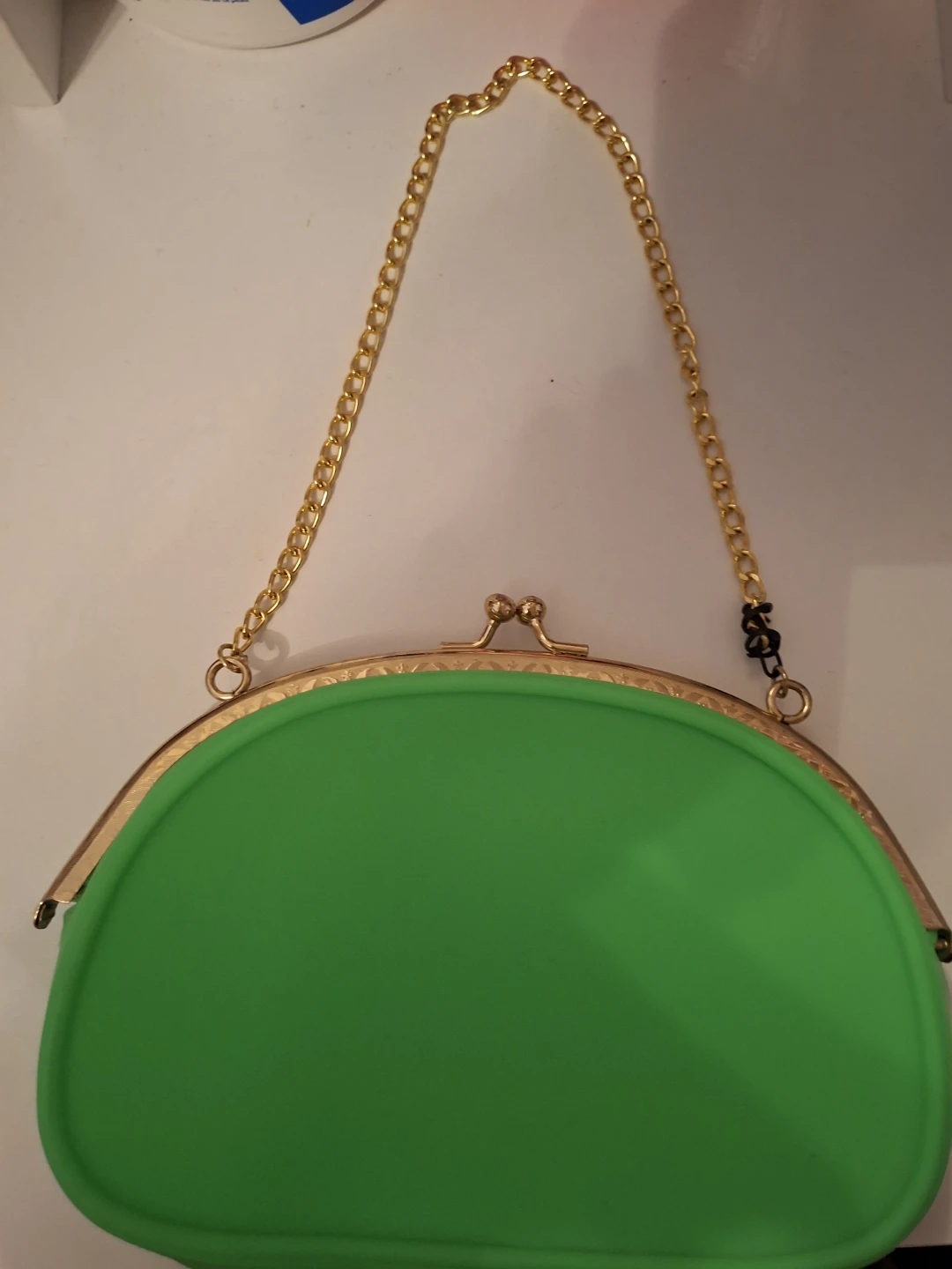 Green coin purse with gold chain