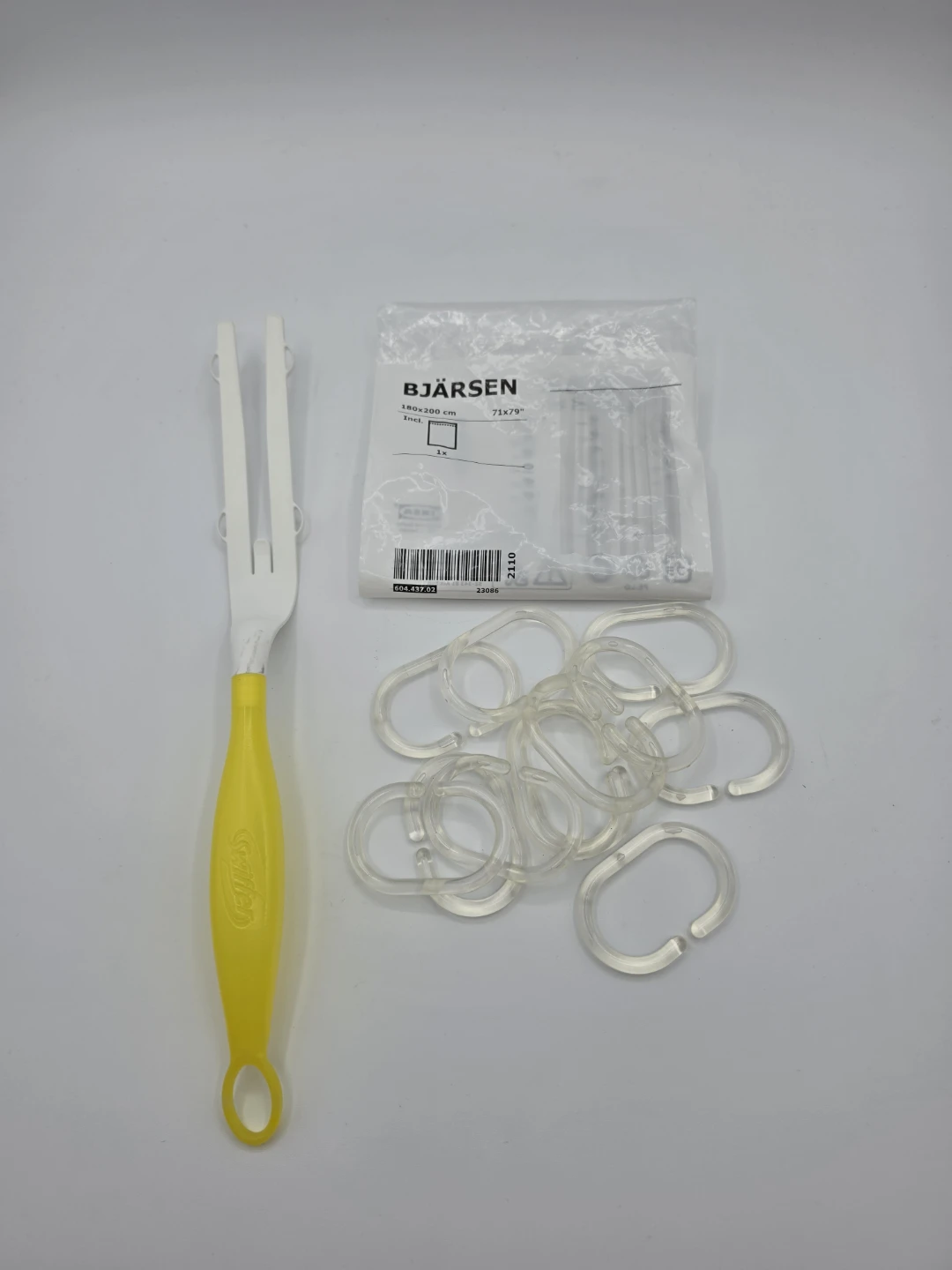 Ikea Shower Curtain Rings and Swiffer duster handle