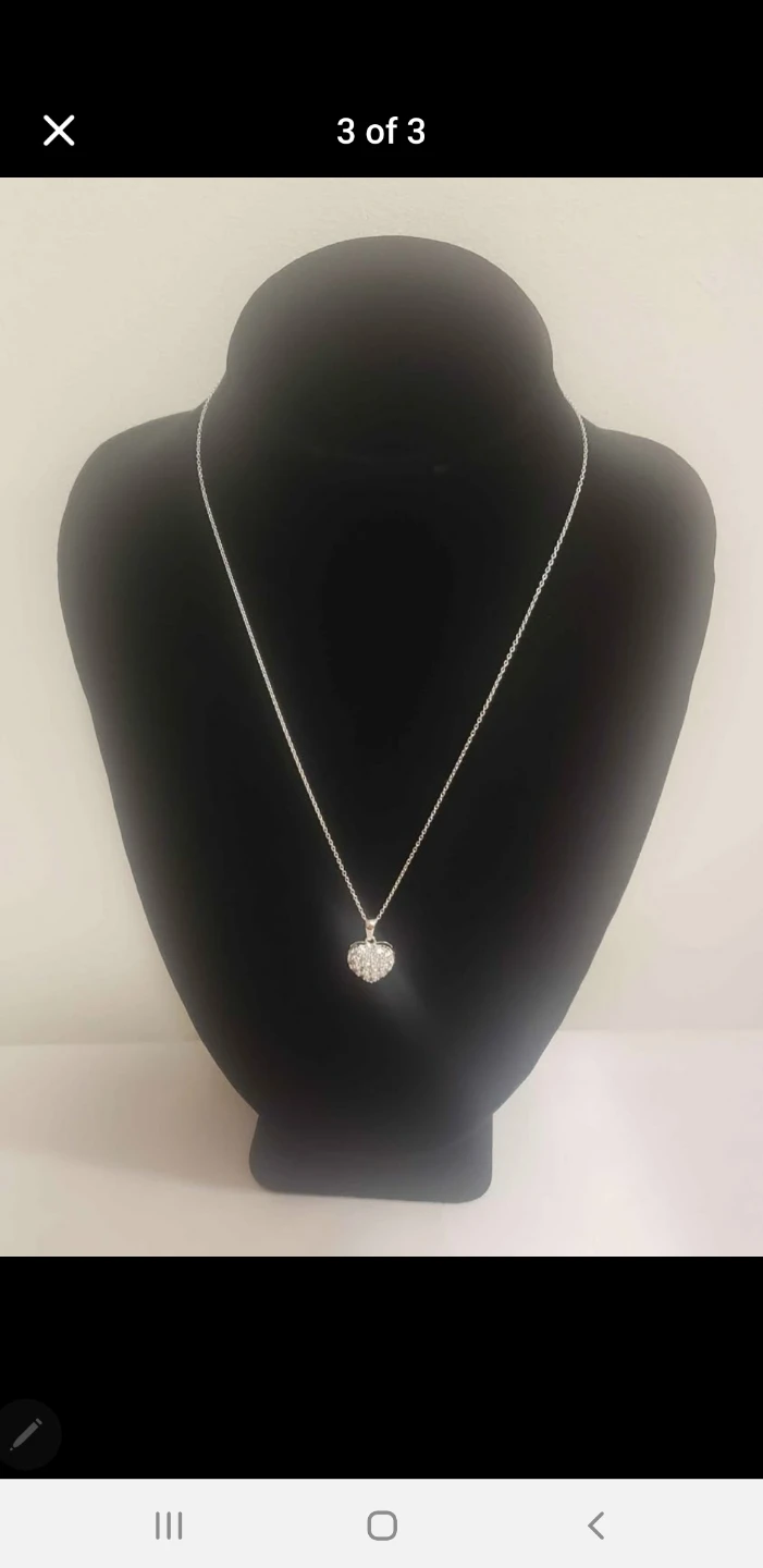 Like new Beautiful w Shiny Sterling Silver Heart Necklace