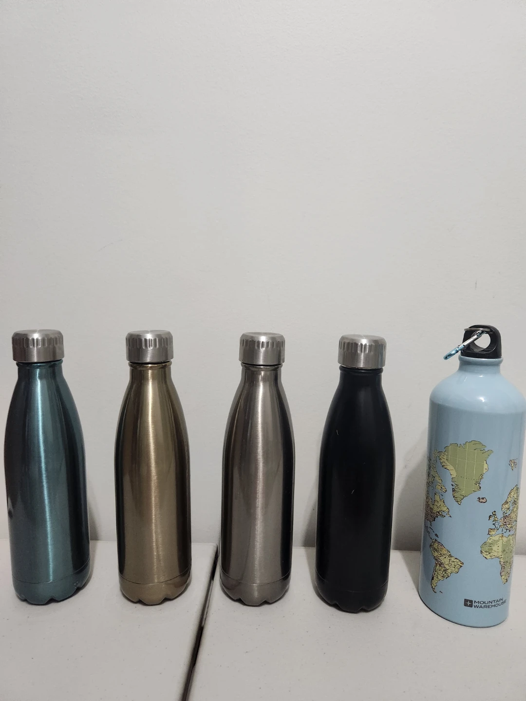 Assorted Water Bottles and Mugs