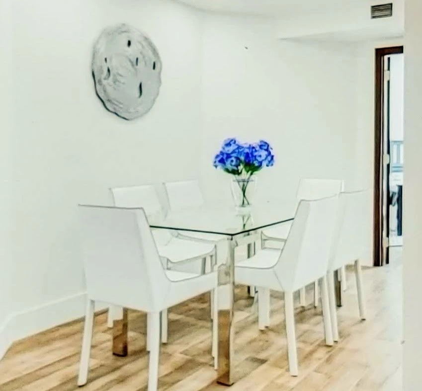 Glass Top Dining Table with 6 White leather Chairs