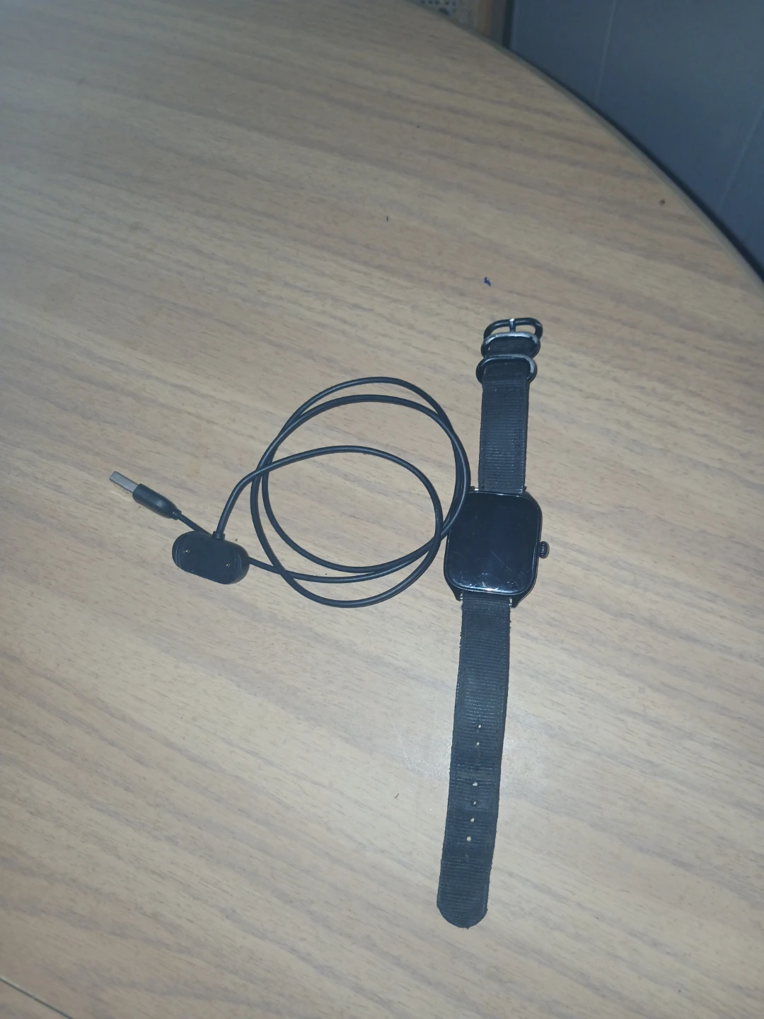 Black Amazfit Smartwatch with Charger