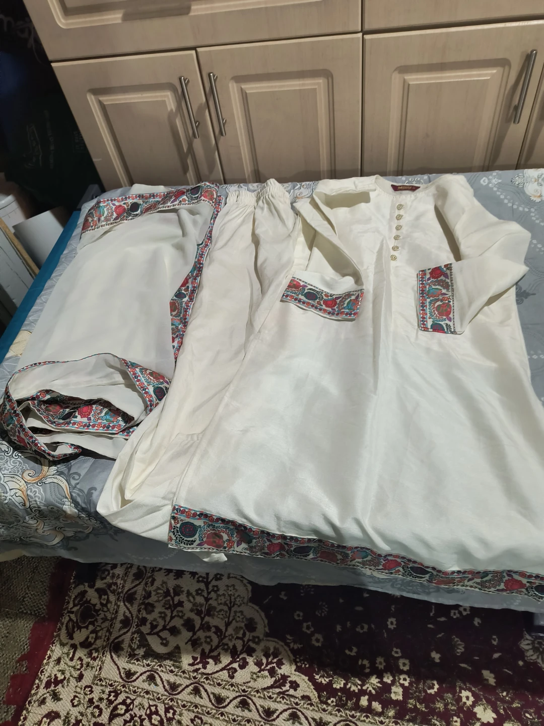 Cream coloured embroidered shalwar kameez set