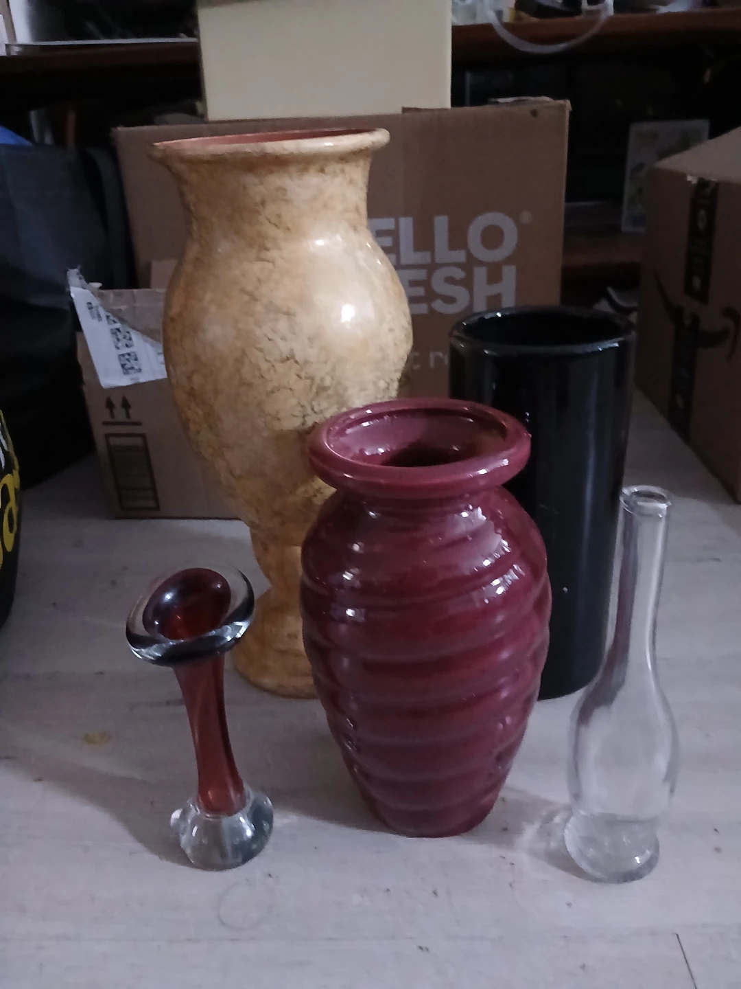 Assorted Vases: Beige, Red, Black, and Clear