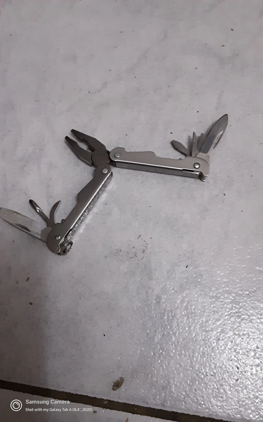 Multi-tool and TELUS Tape Measure - photo 3