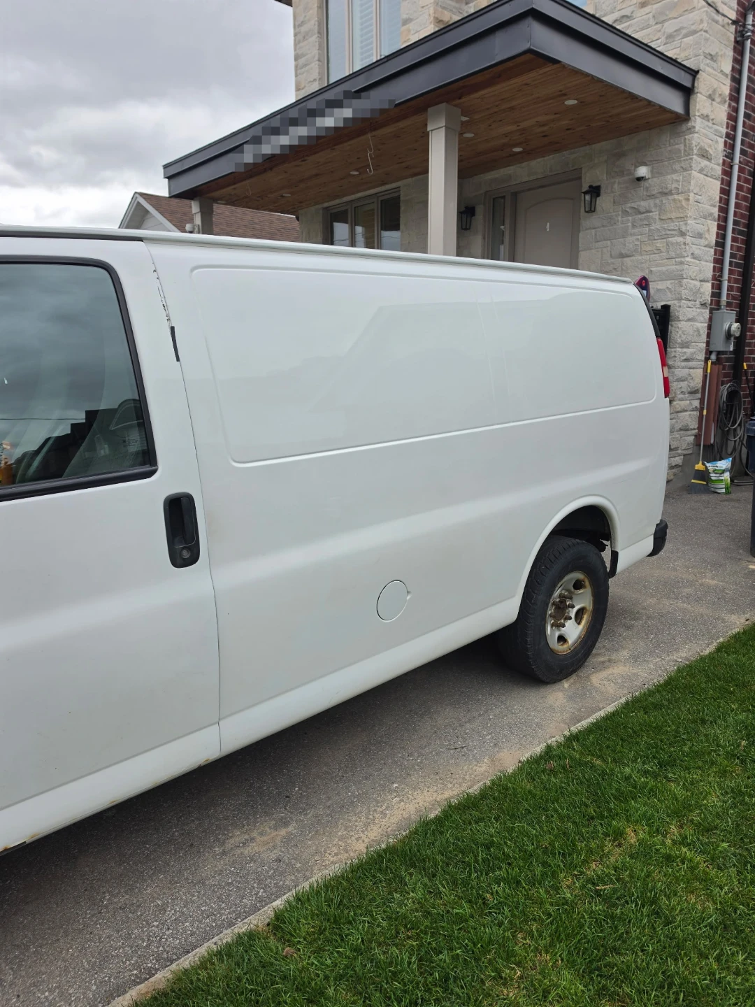 White Chevrolet Cargo Van