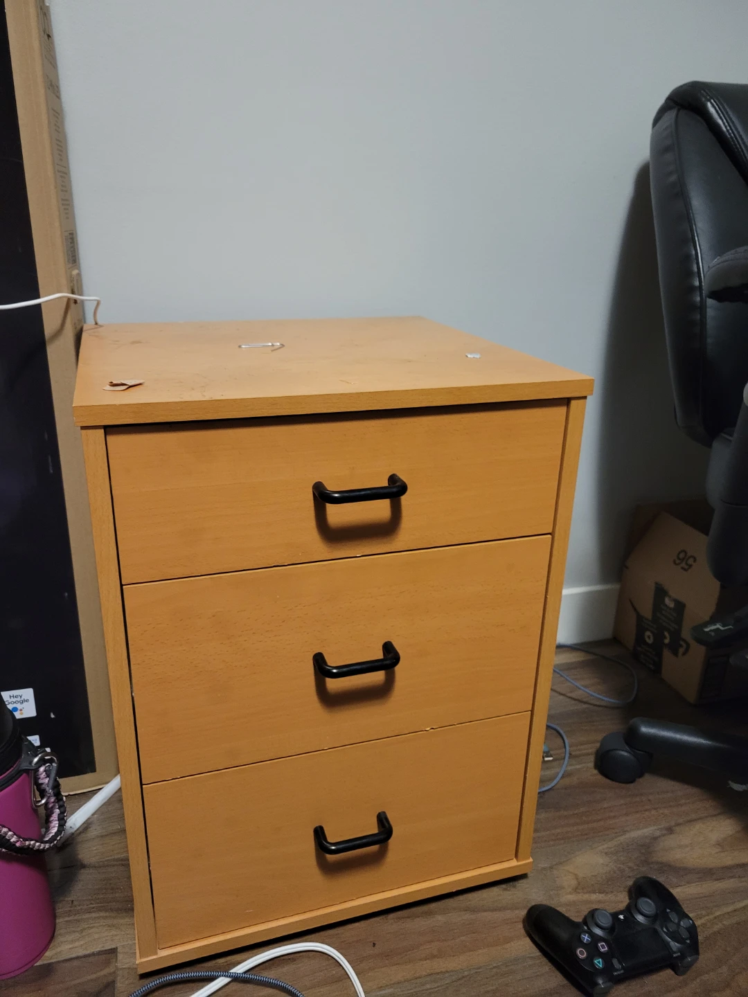 Wooden 3-Drawer side bed cabinet.