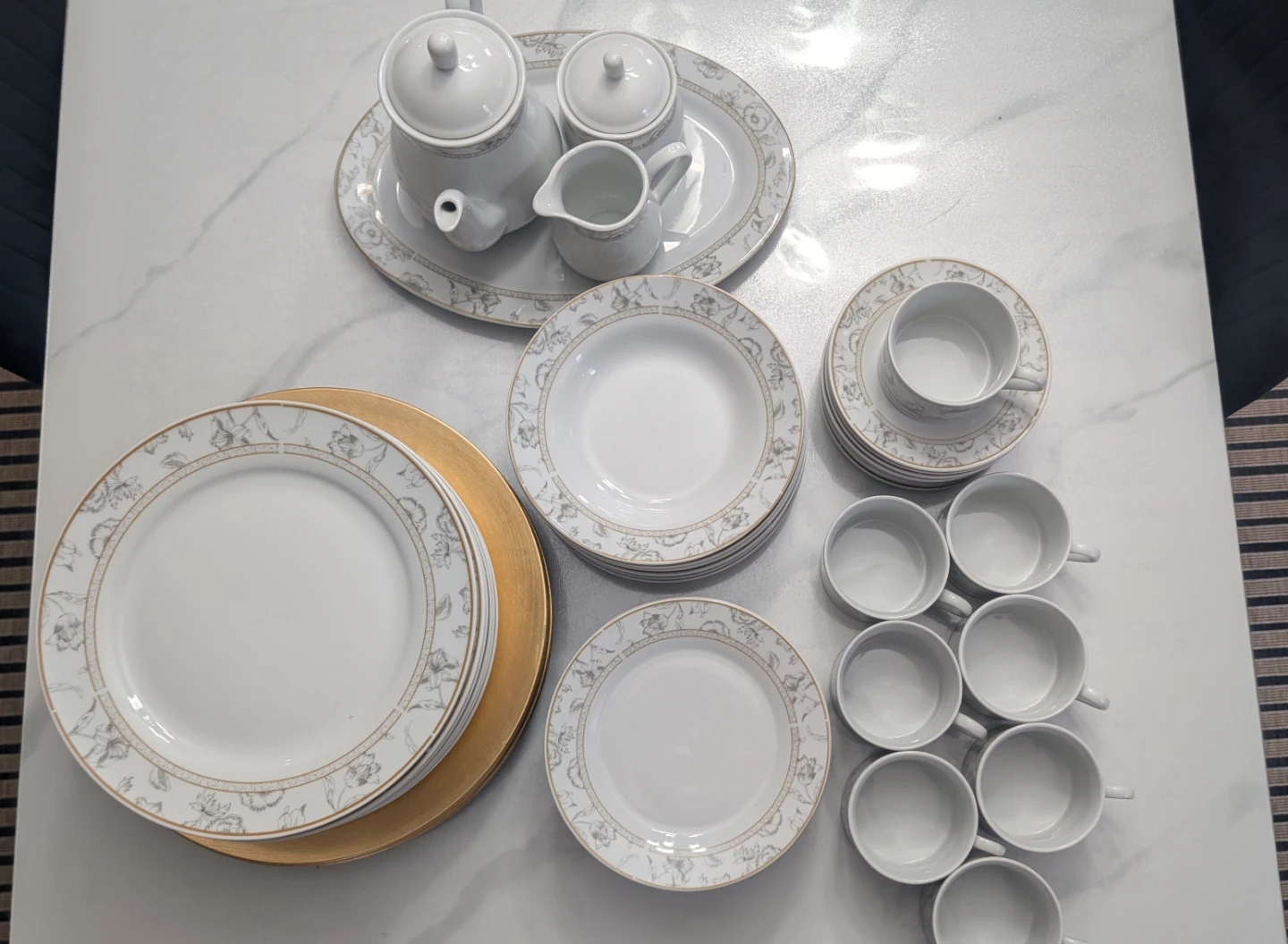 Silvio White Ceramic with floral pattern dinnerware set