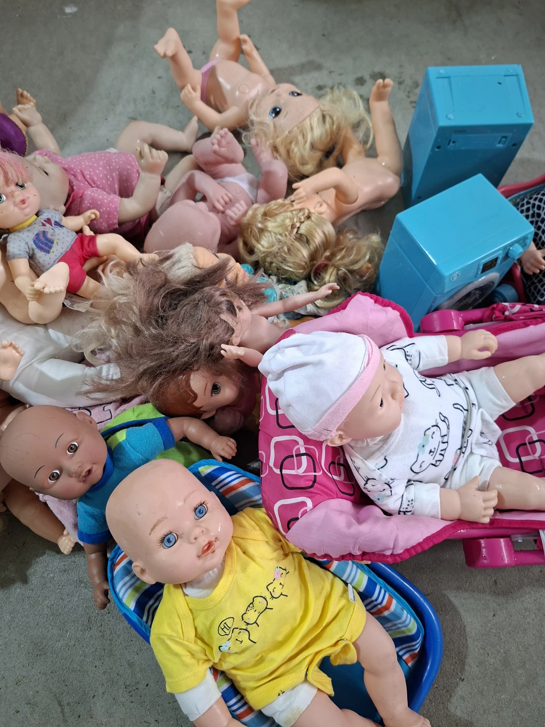 Assorted Lot of Dolls and Toy Washer with free bucket